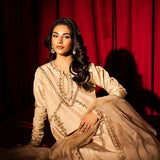 Beige raw silk outfit with emerald embroidery and zardosi detailing.