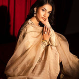 Beige raw silk outfit with emerald embroidery and zardosi detailing.