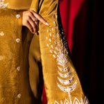 Olive green raw silk outfit with hand-done zardosi, Swarovski embellishments, and an embroidered organza dupatta.