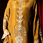 Olive green raw silk outfit with hand-done zardosi, Swarovski embellishments, and an embroidered organza dupatta.