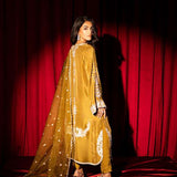 Olive green raw silk outfit with hand-done zardosi, Swarovski embellishments, and an embroidered organza dupatta.