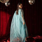 Teal organza outfit with hand-embellished Swarovski crystals, sheer organza dupatta, and raw silk pants.