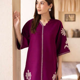 Magenta straight-cut embroidered shirt with delicate powder pink motifs, paired with a sleek skinny shalwar from COCO.