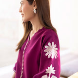Magenta straight-cut embroidered shirt with delicate powder pink motifs, paired with a sleek skinny shalwar from COCO.