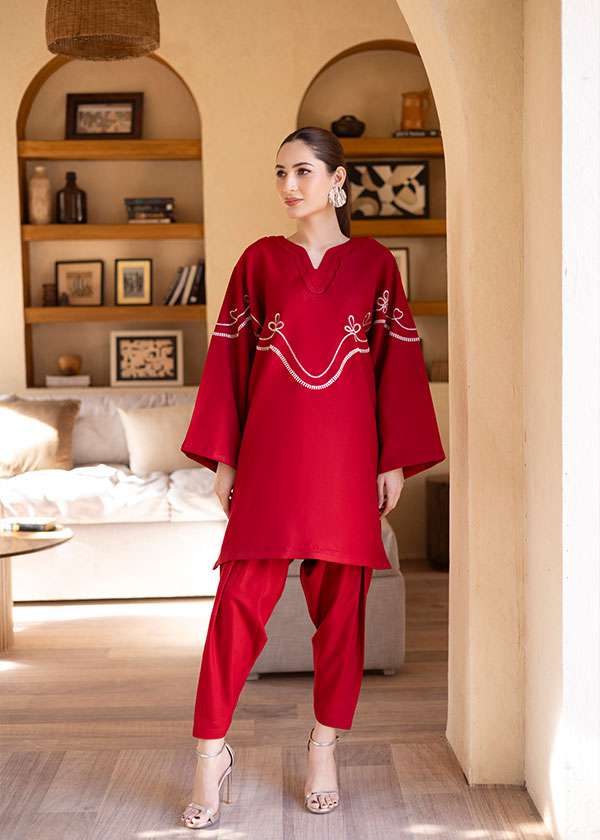Buy Bon Cherri cherry red embroidered tunic set online â?? a playful yet elegant ensemble featuring whimsical white embroidery, a sleek skinny shalwar, and a feminine silhouette.