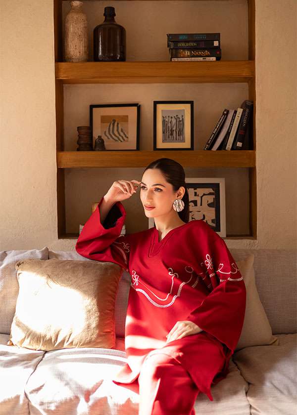 Buy Bon Cherri cherry red embroidered tunic set online â?? a playful yet elegant ensemble featuring whimsical white embroidery, a sleek skinny shalwar, and a feminine silhouette.