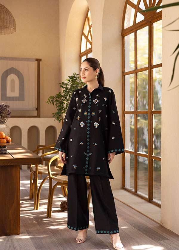 Buy a Noire black embroidered outfit online featuring a sleek collared neckline, intricate turquoise embroidery, and tailored straight pants for a refined look.
