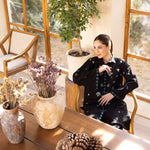 Buy a Noire black embroidered outfit online featuring a sleek collared neckline, intricate turquoise embroidery, and tailored straight pants for a refined look.