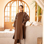 Buy a brown embroidered outfit online featuring a band collar, pleated front, baggy sleeves, and straight pants for an elegant, modern look.