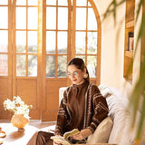 Buy a brown embroidered outfit online featuring a band collar, pleated front, baggy sleeves, and straight pants for an elegant, modern look.