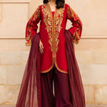 Aabroo embroidered raw silk party wear dress with organza dupatta.

