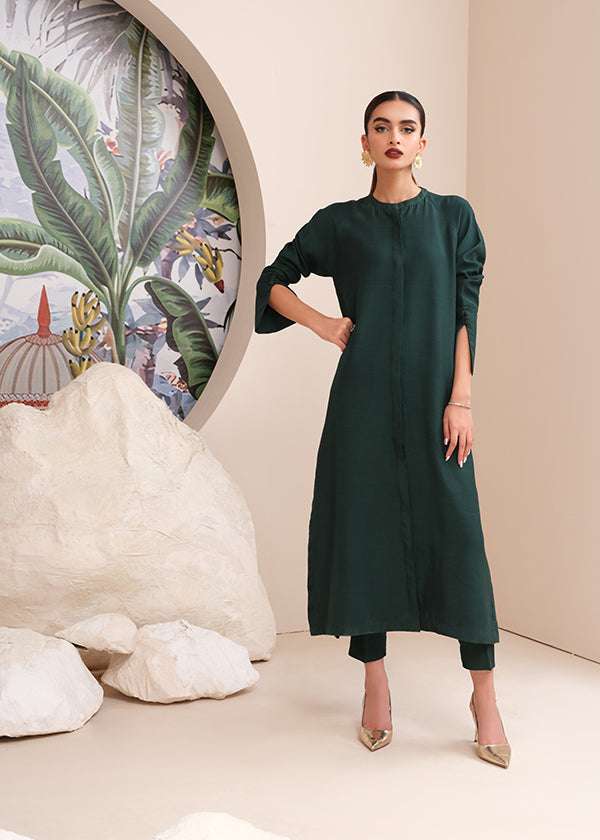 Buy an emerald green raw silk button-down shirt online with concealed buttons, delicate stitching, and elegant cuffs for a modern, refined look.