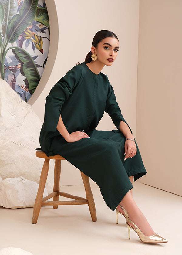 Buy an emerald green raw silk button-down shirt online with concealed buttons, delicate stitching, and elegant cuffs for a modern, refined look.