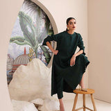 Buy an emerald green raw silk button-down shirt online with concealed buttons, delicate stitching, and elegant cuffs for a modern, refined look.