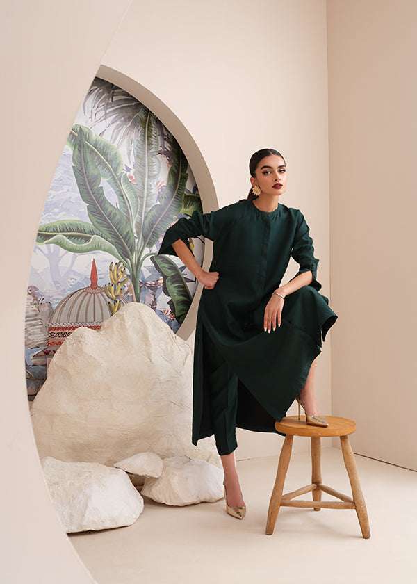 Buy an emerald green raw silk button-down shirt online with concealed buttons, delicate stitching, and elegant cuffs for a modern, refined look.