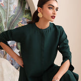 Buy an emerald green raw silk button-down shirt online with concealed buttons, delicate stitching, and elegant cuffs for a modern, refined look.