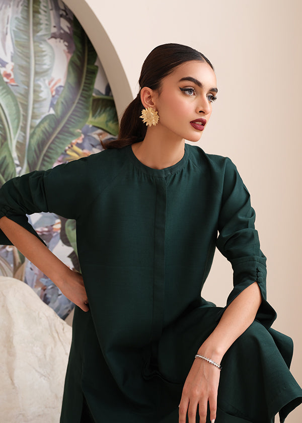 Buy an emerald green raw silk button-down shirt online with concealed buttons, delicate stitching, and elegant cuffs for a modern, refined look.