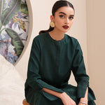Buy an emerald green raw silk button-down shirt online with concealed buttons, delicate stitching, and elegant cuffs for a modern, refined look.