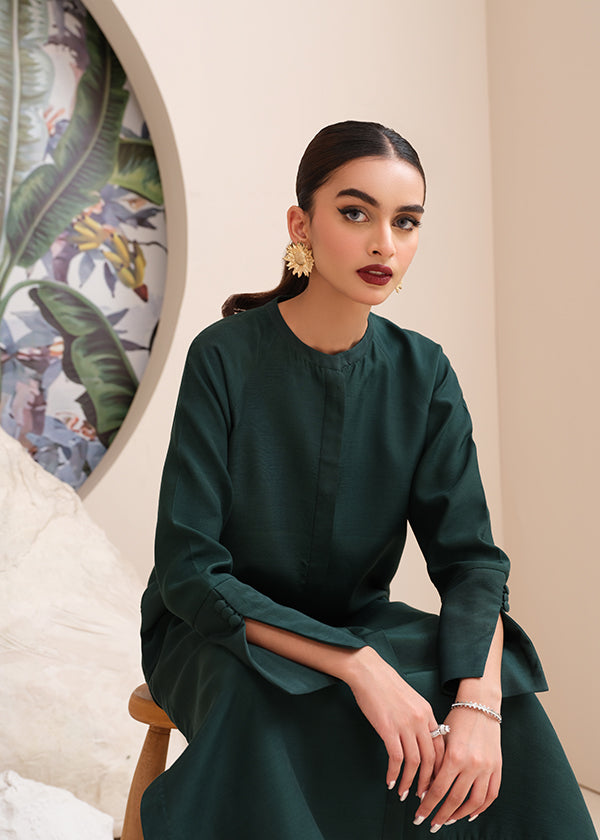 Buy an emerald green raw silk button-down shirt online with concealed buttons, delicate stitching, and elegant cuffs for a modern, refined look.