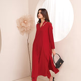 Crimson crepe suit with V-neck and minimalist stitching, exuding understated luxury.